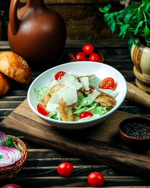 Classic caesar salad with grated parmesan cheese