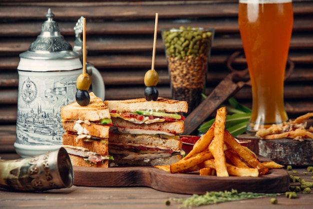 Classic club sandwich with french fries