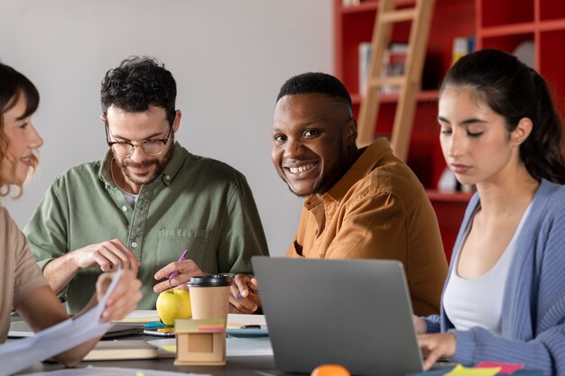 Classmates learning and smiling during study session