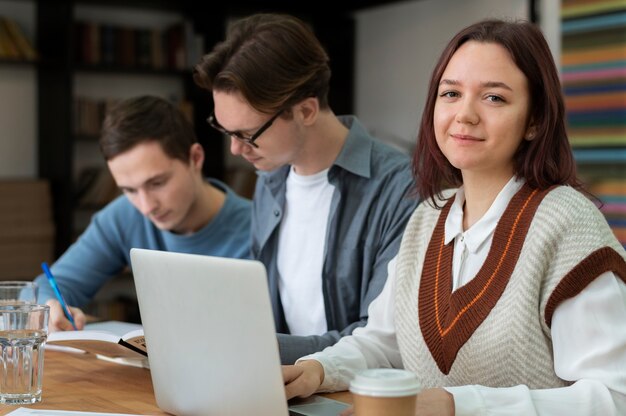 Classmates learning together during group study