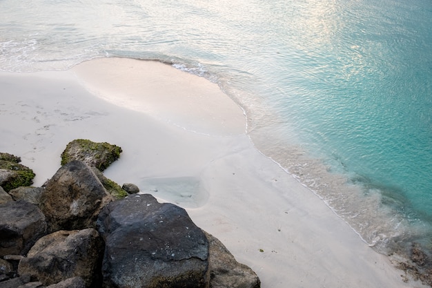 Clean sandy beach with clear blue sea-good