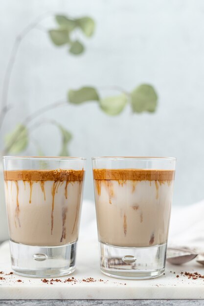 Clear drinking glass with brown juice