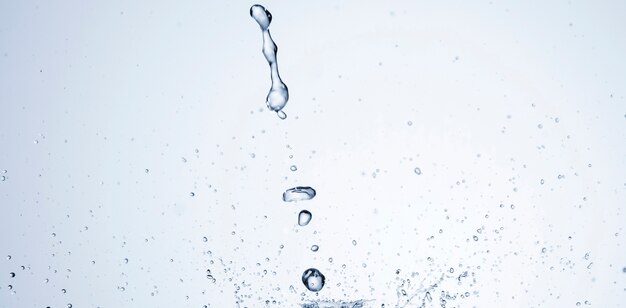 Clear water splash on light background