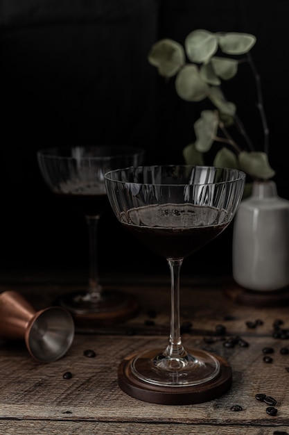 Clear wine glass on brown wooden table