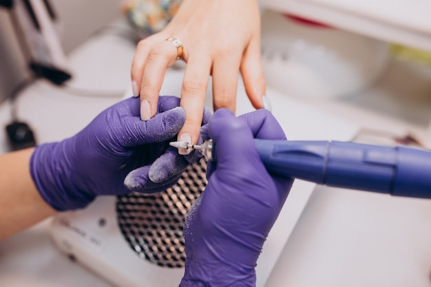 Client making manicure at a beauty salon