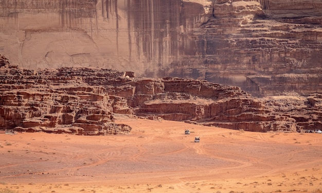 Free photo cliffs and caves on a desert under the sunlight at daytime