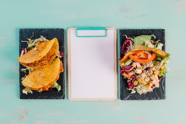 Free photo clipboard between mexican dishes