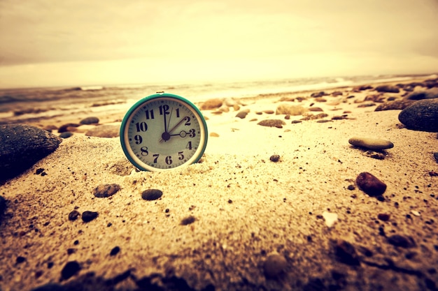 Free Photo clock on the beach. time and business concept.