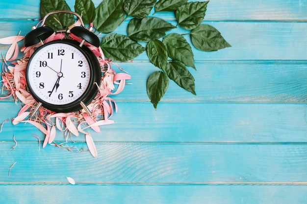 Clock placed in petals