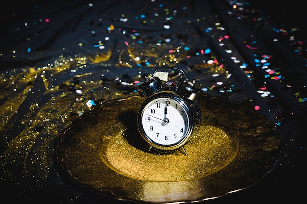 Clock on plate with sequins 