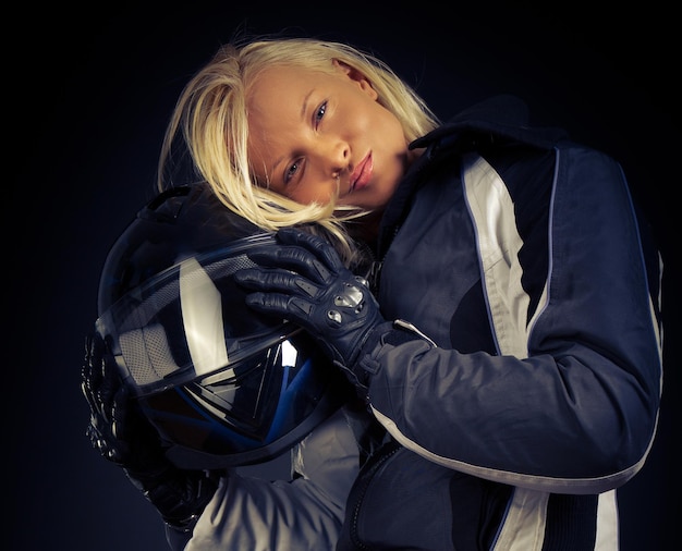 Close image of motorcyclist . Studio shot