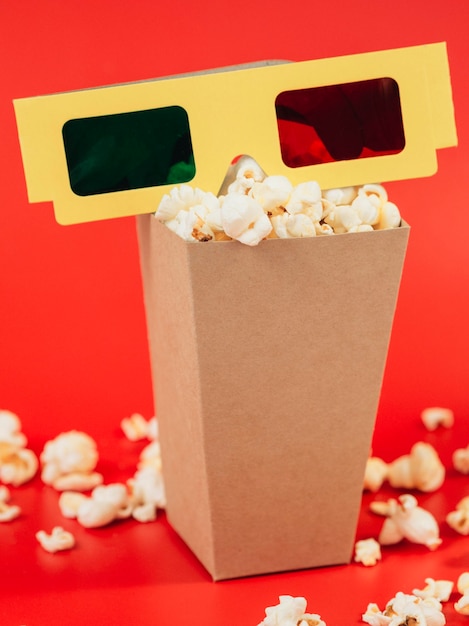 Close-up 3d glasses with popcorn box