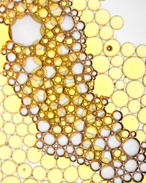 Free photo close-up abstract golden bubbles