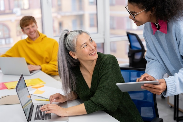 Close up on adult woman working in office