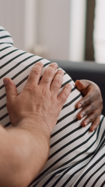 Free Photo close up of african american woman with baby bump