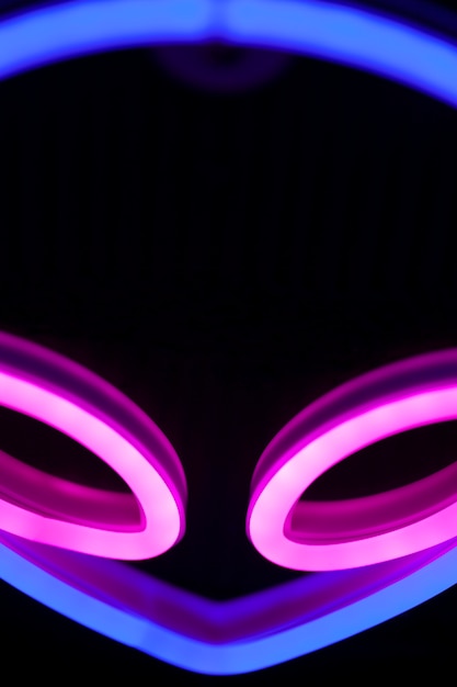 Close up on alien neon sign