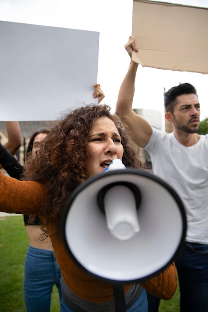 Free photo close up angry people at protest