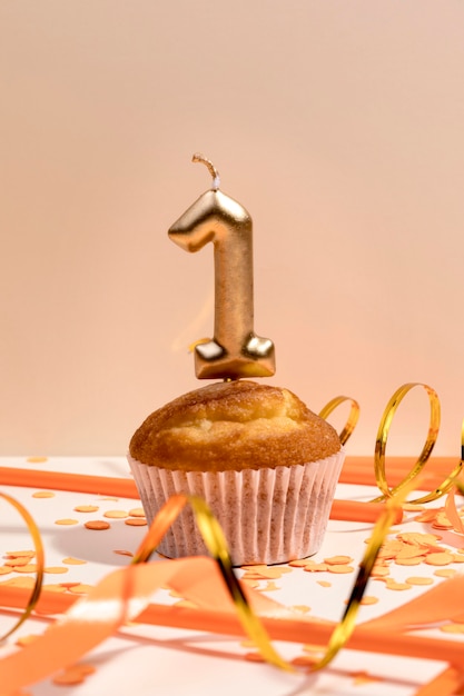 Close-up anniversary cupcake on table