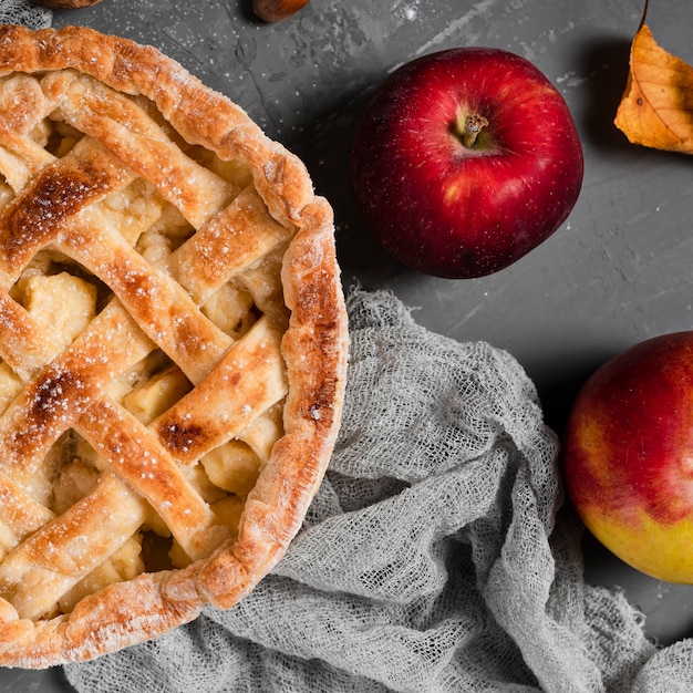 Close-up of appetizing pie and apples