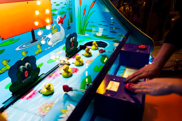 Close-up arcade game with rubber ducks