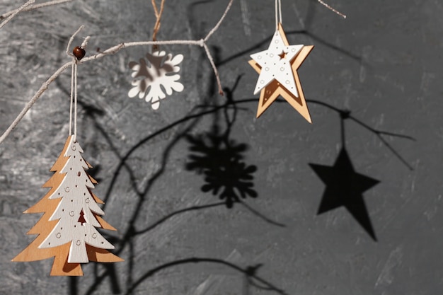 Close-up arrangement with decorated tree and stucco background