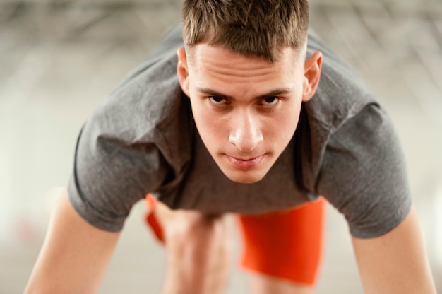 Free photo close-up athlete ready to run