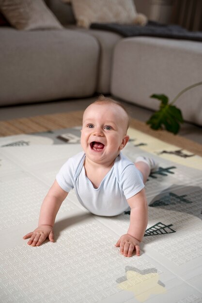 Close up on baby crawling and learning to walk