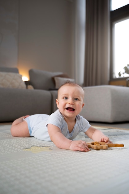 Close up on baby crawling and learning to walk