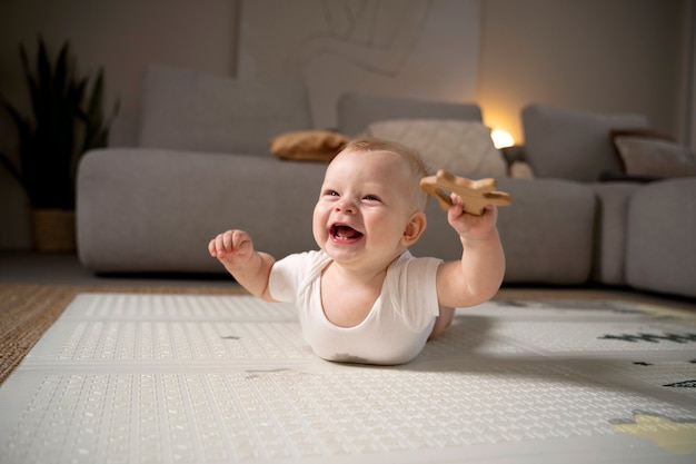 Close up on baby crawling and learning to walk