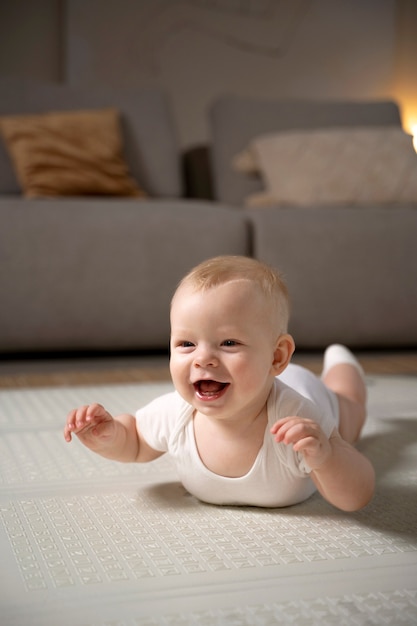 Close up on baby crawling and learning to walk