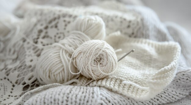 Close-up of balls of yarn for knitting in pastel colors.