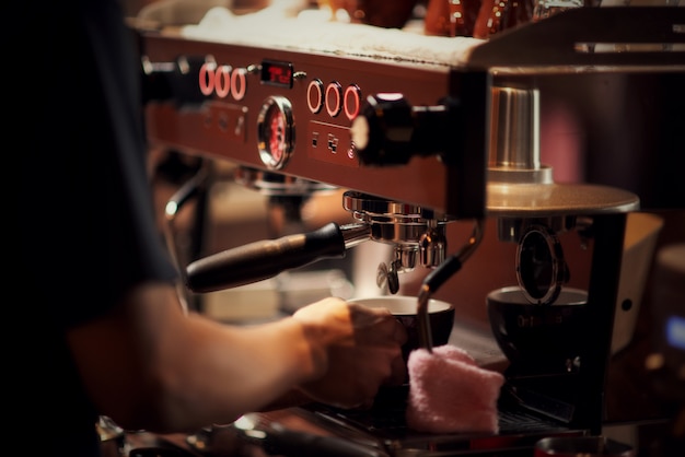 Close up Barista making cappuccino, bartender preparing coffee drink