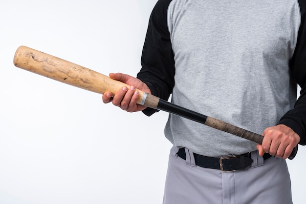 Free photo close-up of baseball player holding bat