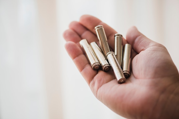 Free photo close-up of battery cells in hand