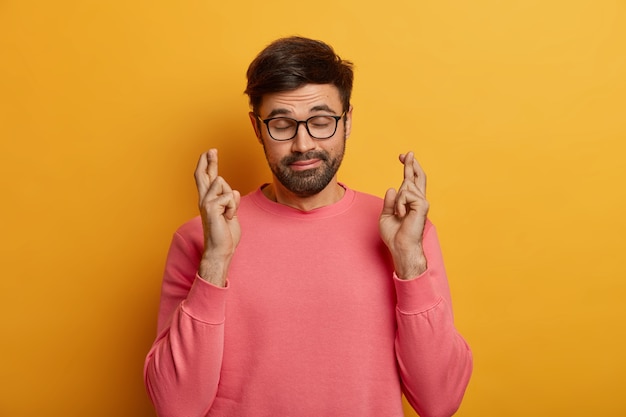 Free Photo close up on bearded young man wearing glasses isolated