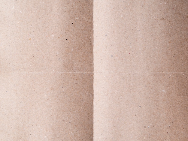 Free photo close-up beige paper background