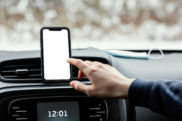 Free Photo close up blank screen mobile in car