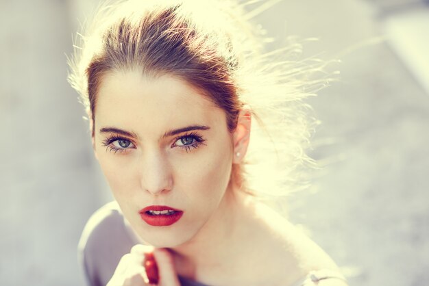 Close-up of blonde young woman with an intense look