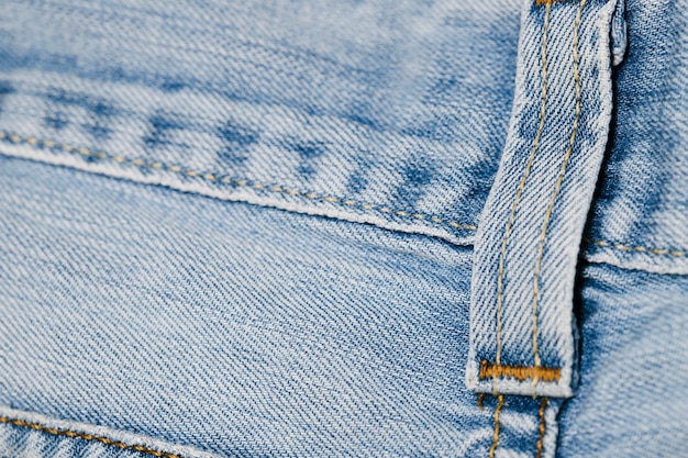 Close-up blue jeans belt loop