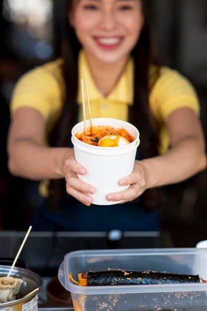 Close up blurry woman with food