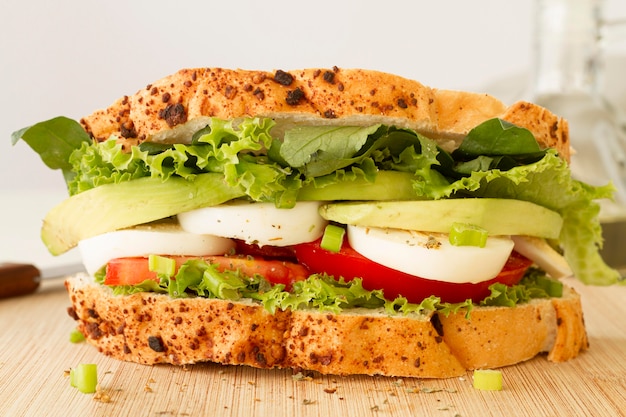 Close-up boiled egg and tomatoes sandwich