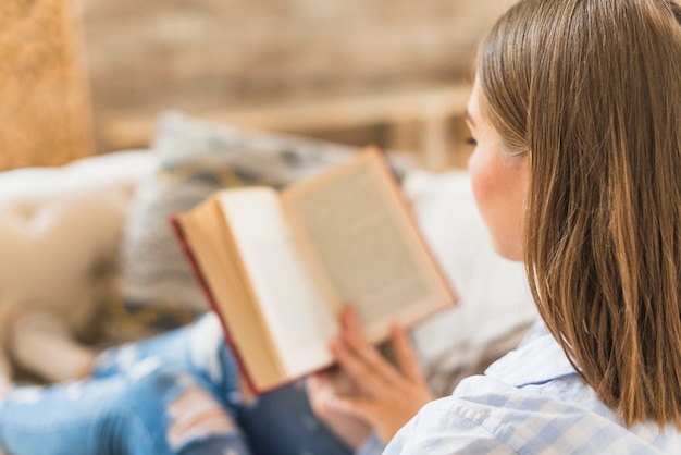 Free Photo close-up of a book reader at home