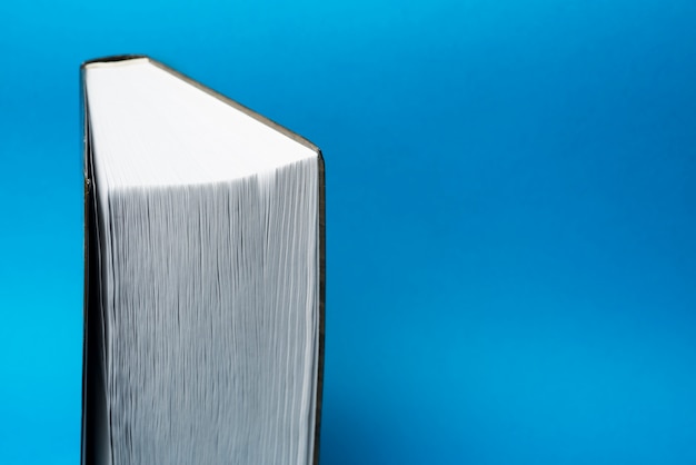 Free photo close-up of book with blue background