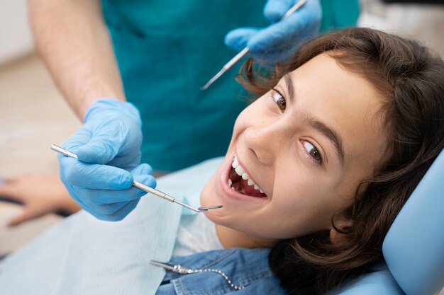 Close up on boy at the dentist