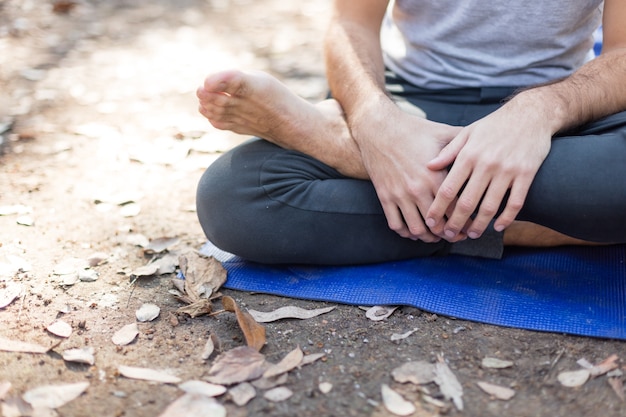 Close-up of boy sitting cross-legged