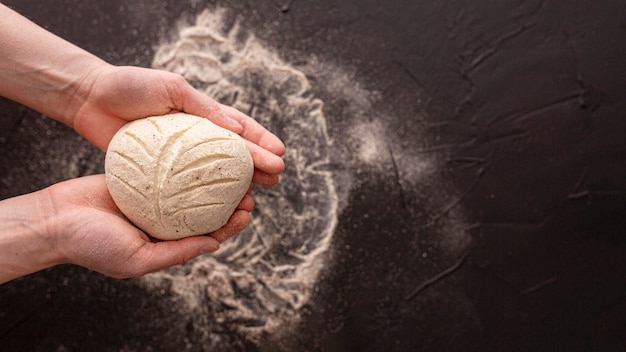 Close-up bread dough with dark background