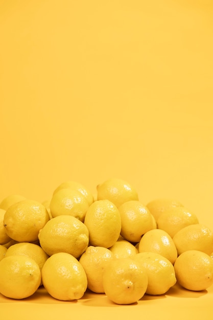 Close-up bunch of lemons with copy space