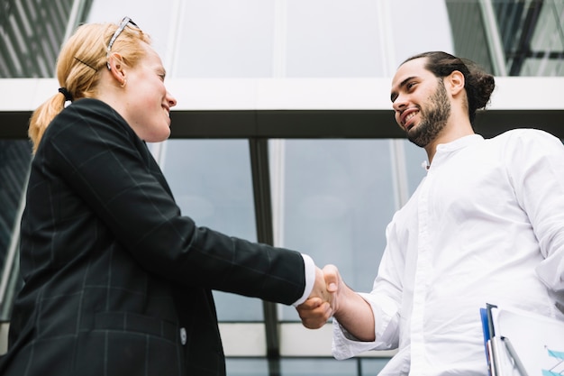 Free Photo close-up of business partners shaking hands