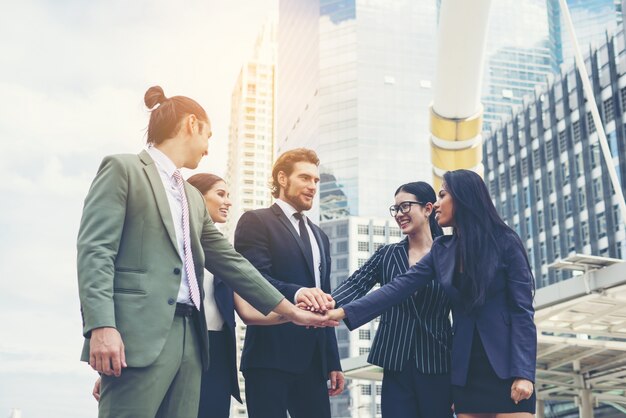 Close up of business people hands together. Teamwork concept.