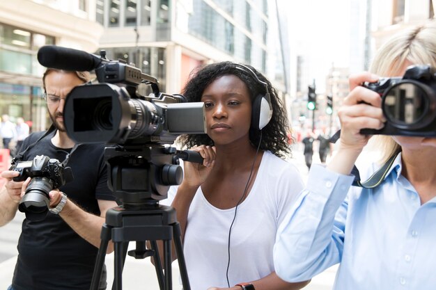 Close up on camera crew filming an interview